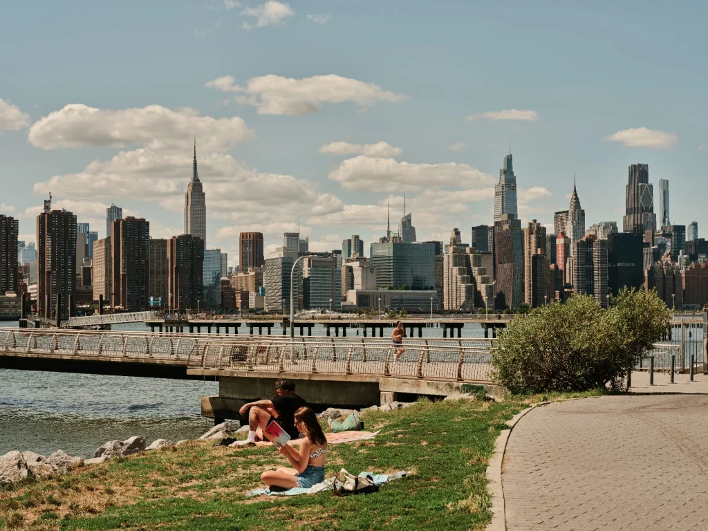 Greenpoint, Brooklyn. Transmitter Park with view of the water and Manhattan skyline.